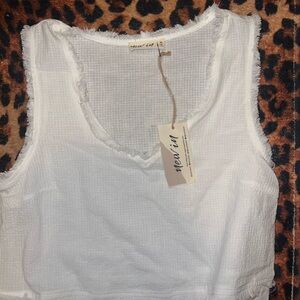 New In boutique sleeveless white top. So cute with shorts!